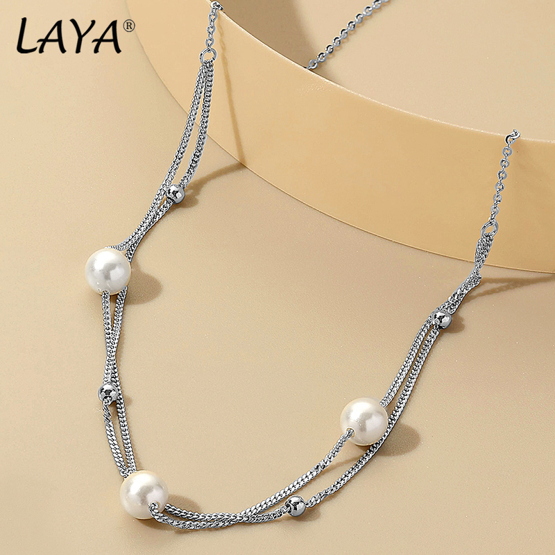 LAYA Minimalist Shell Pearl Mu - огляд і ціна Freshwater Line